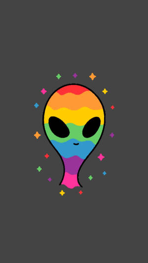 一個微笑的彩虹外星人，帶有閃光，背景為深灰色。