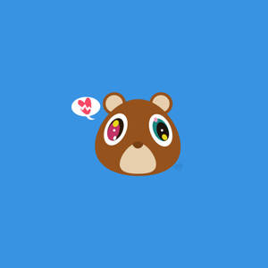 一隻卡通熊，有著彩色眼睛和心形對話氣泡，背景為藍色。 — 熊 GIF 壁紙