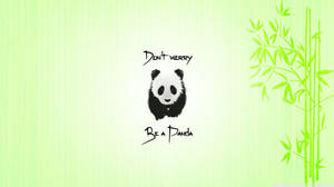 熊貓插圖，帶有文字「Don't worry Be a Panda」和竹子設計。 — 熊貓 GIF 壁紙