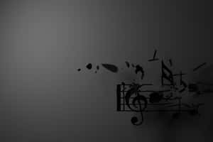 破碎的音符和五線譜漂浮在灰色漸變背景上。 — 音樂美學 壁紙