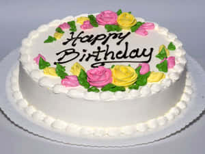 白色生日蛋糕，配有粉紅色黃色玫瑰和Happy Birthday訊息。 — 生日快樂蛋糕 壁紙