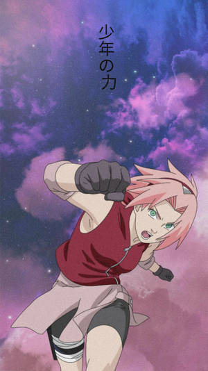 粉紅色頭髮的動漫女孩在星空紫色天空下向前出拳。 — 櫻島麻衣 壁紙
