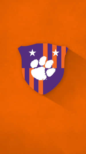 Clemson Tigers運動標誌盾牌，有腳印和星星，橙色背景 — 底特律老虎 壁紙