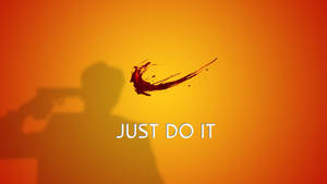 手持槍枝的剪影，紅色油漆飛濺形成Nike swoosh和文字just do it。 — 就去做吧 壁紙