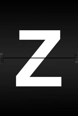 在深色背景上帶有膠片條標記的一個大白色字母Z。 — 字母 Z 壁紙