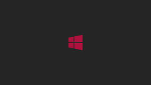 深灰色背景上的紅色Windows標誌 — 簡約暗黑美學 壁紙