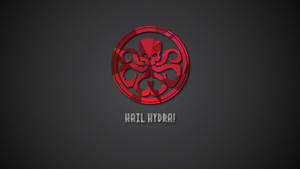 深灰色背景上帶有骷髏頭和觸手的紅色九頭蛇標誌，文字 Hail Hydra — 紅骷髏 壁紙