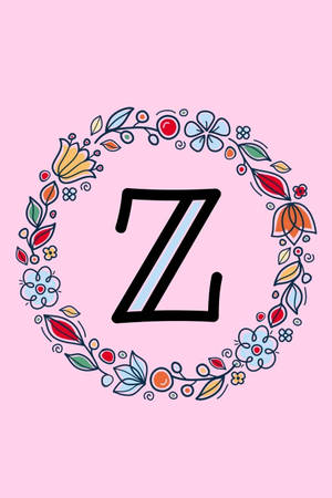 一個風格化的字母Z，被粉紅色上色彩繽紛的花環環繞。 — 字母 Z 壁紙