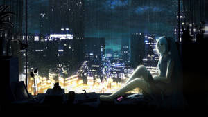 動漫女孩坐在窗邊觀看雨夜城市 — 美麗的藍色 壁紙