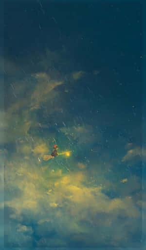 一個女巫騎著掃帚飛過下雨的夜空，手持發光燈籠。 — 吉卜力工作室 手機 壁紙