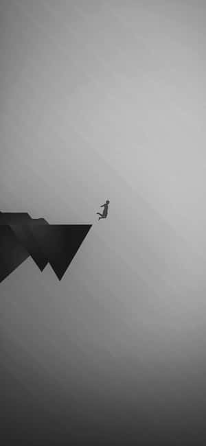 在極簡黑白場景中，一個人從幾何懸崖上跳下。 — 簡約暗黑美學 壁紙