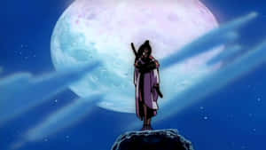武士戰士獨自站在懸崖上，下方是星空夜晚中的巨大月亮。 — 戰士 壁紙