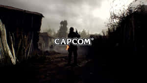 黃昏時分，毀滅村莊中武裝人物的剪影，帶有Capcom標誌。 — 卡普空 壁紙