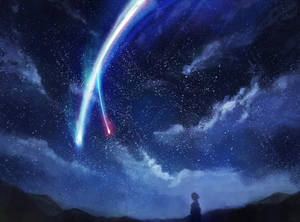 一個人觀看彩色彗星劃過星空夜空的剪影。 — 三宅隆 壁紙