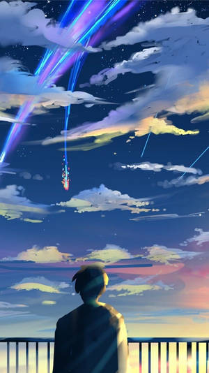 人在暮色天空中觀看多彩的宇宙條紋。 — 三島一八 壁紙