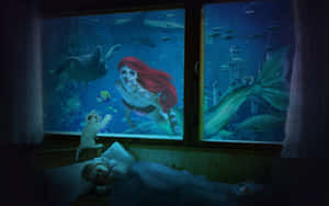 一個孩子睡覺時，美人魚和海洋生物在一個巨大的水族箱窗戶中游泳。 — 美人魚 壁紙