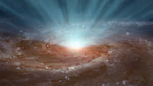 一個螺旋星系從中心發出藍光，被微紅色塵埃包圍。 — 宇宙美學 壁紙