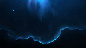深空中帶有散落星星的發光藍色星雲。 — 暗黑美學電腦 壁紙