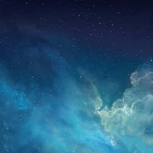 在深空星場下發光的鮮豔藍色和青色星雲。 — iPad Air 壁紙
