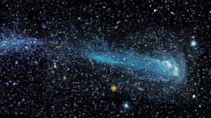 在深空中被無數星星包圍的發光藍色和黃色星雲。 — 宇宙 壁紙