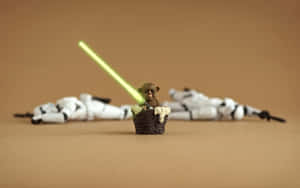 籃子裡的Ewok，綠色光劍，後面有倒下的Stormtrooper。 — 酷炫星際大戰 壁紙