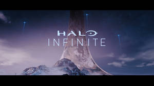 Halo Infinite 標題畫面，在星空下雪山中的巨大獨石。 — 最後一戰：無限 4K 壁紙