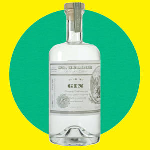 St George Terroir 琴酒瓶，帶有復古標籤，置於黃色和藍綠色圓形背景上。 — 品牌 壁紙