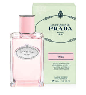 白色背景上的 Prada Rose 香水瓶和盒子 — 榮耀Magic V 壁紙