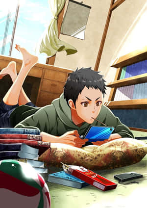 動漫男孩在窗邊的軟墊地上玩掌上遊戲機。 — 排球少年 壁紙