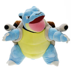 一個藍色和黃色 Blastoise 毛絨玩具，張大嘴巴，伸出雙臂。 — 水箭龜 壁紙