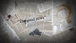 撕裂的報紙剪報，帶有濺出的墨水和可見的「The good news」一詞。 — 美學語錄動圖 壁紙
