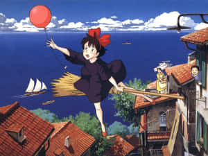 女孩騎掃帚飛過屋頂，有紅色氣球和海景。 — 桐人 壁紙