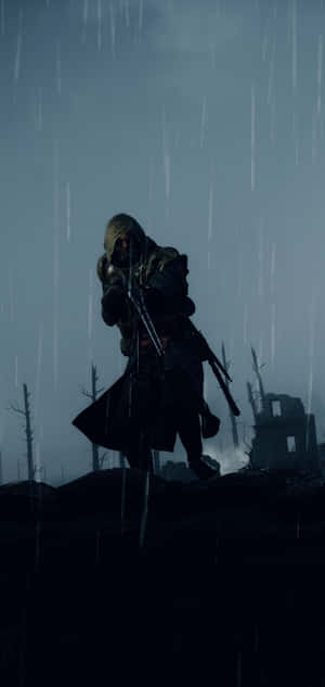 一個戴著兜帽的士兵手持步槍，站在下雨的廢墟景觀中。 — 電玩遊戲 GIF 壁紙