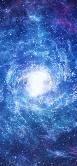 充滿活力的藍色和紫色星系，帶有明亮核心和散落的星星。 — 藍色銀河 壁紙