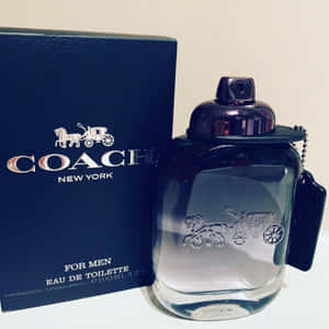 Coach for men香水瓶和帶有馬車標誌的盒子。 — 教練 壁紙