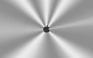 拉絲金屬上帶有輻射光線條紋的Apple標誌。 — 16:10 壁紙