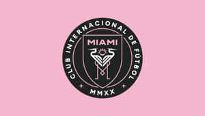 Club Internacional de Fútbol Miami 標誌，在粉紅色背景上帶有風格化的鳥和太陽設計。 — 運動 壁紙