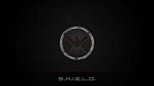 深色網格背景上帶有紅色高光的S.H.I.E.L.D.標誌 — 寶可夢 剑 盾 壁紙