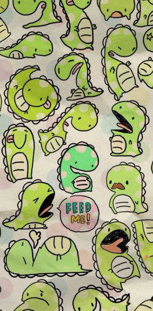 帶有波點的綠色卡通恐龍和寫著「FEED ME!」的對話氣泡。 — 可愛卡通 壁紙