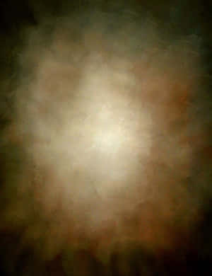 在黑暗背景下，霧雲中一個發光的球體散發著溫暖的光芒。 — 明亮 壁紙