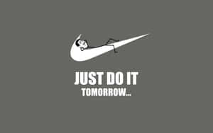 一個火柴人在Nike勾勾內小睡，並帶有文字just do it tomorrow。 — 簡約 壁紙