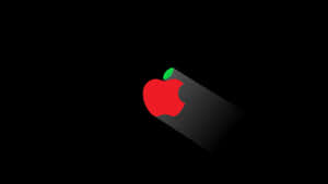 紅色蘋果標誌帶綠色葉子在黑色背景上投下陰影 — 4K Apple 壁紙