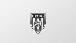 Heracles 運動隊標誌，帶有咆哮的獅子和 1903 年成立年份。 — 中性 壁紙