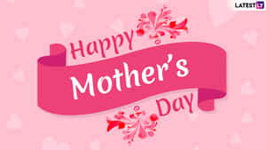 Happy Mother's Day 橫幅，帶有粉紅色絲帶和花卉裝飾，背景為心形圖案。 — 乾淨 壁紙