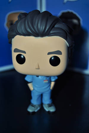 穿著藍色手術服的深色頭髮Funko Pop公仔 — Funko Pop 壁紙