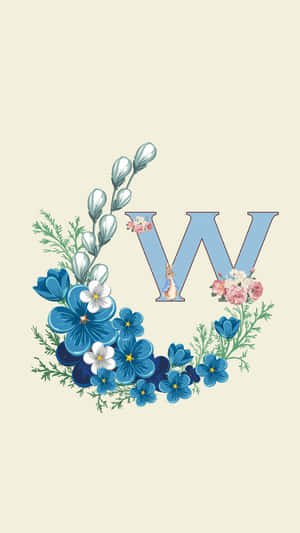字母W以藍色和粉紅色花朵及綠葉裝飾。 — 花朵 壁紙