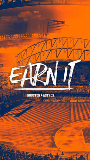 休士頓太空人棒球場，帶有橙色和藍色的 'EARN IT' 勵志標語。 — Lexus 標誌 壁紙