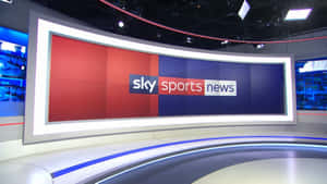 Sky Sports News 工作室，配備弧形螢幕和藍紅背景。 — 極限運動 壁紙