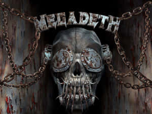 生鏽的金屬頭骨，帶有尖刺牙齒和護目鏡，在 'Megadeth' 樂隊名稱下方，由鏈條框住。 — 金屬質感 壁紙