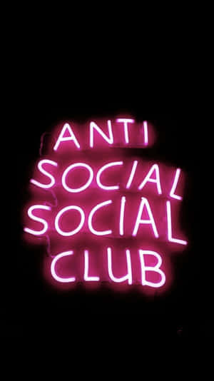 粉紅色霓虹燈牌，上面寫著 Anti Social Social Club，背景為黑色 — 粉紅色 壁紙
